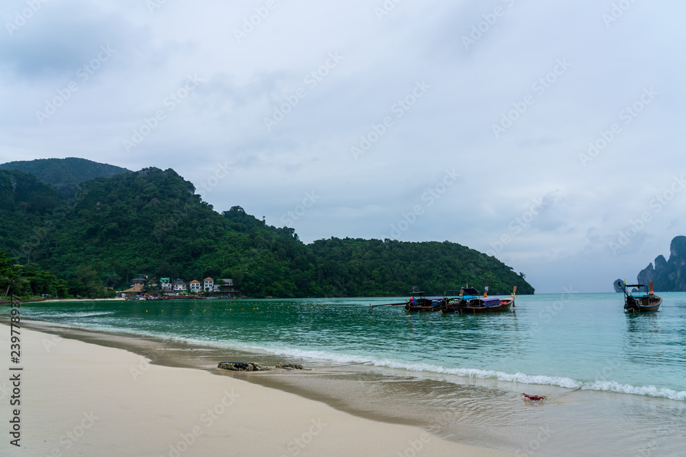 Fototapeta premium Beautiful Tropical Beach PP Island, Krabi, Phuket, Thailand. blue ocean background Summer view Sunshine at Sand and Sea Asia Beach Destinations 
