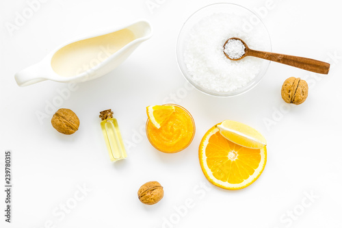 body treatment with citrus cosmetic set white desk background top view pattern
