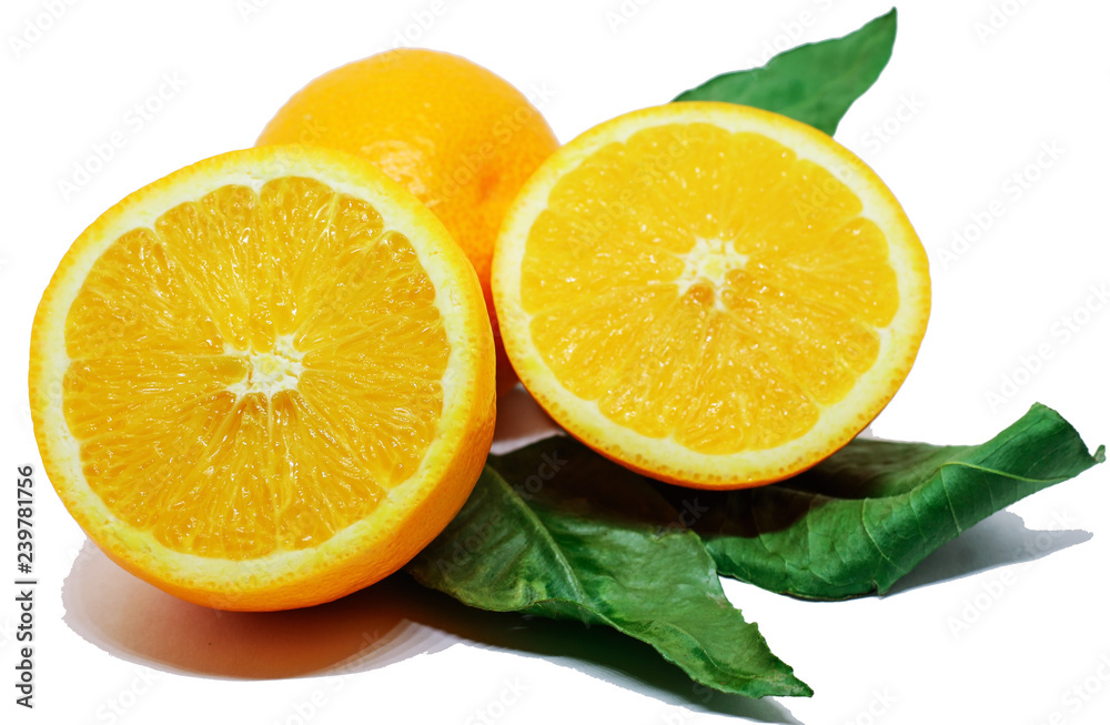 Two halves of cut orange and one tangerine on green leaves on white background Two halves of cut orange and one tangerine on green leaves on white background