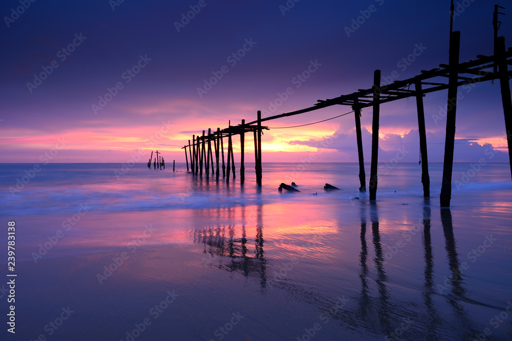 Seascape of Jetty wooden in Pilai beach, Phang-Nga, Thailand. Beautiful of seascape at sunset in sea southern of Thailand, Seascape of Jetty wooden in Pilai beach, Phang-Nga, Thailand. Beautiful of seascape at sunset in sea southern of Thailand,