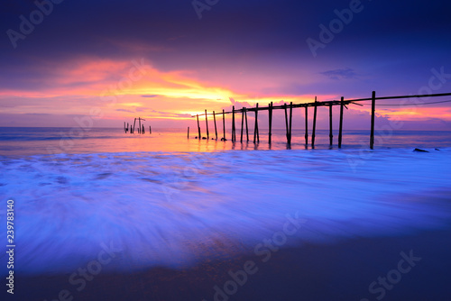 Seascape of Jetty wooden in Pilai beach  Phang-Nga  Thailand. Beautiful of seascape at sunset in sea southern of Thailand  