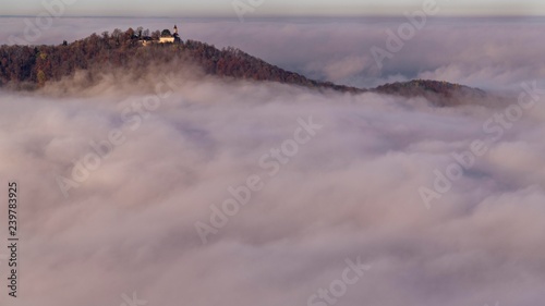 Fog, Teck Castle above the clouds, biosphere area Swabian Alb, Baden-Wurttemberg, Germany, Europe photo