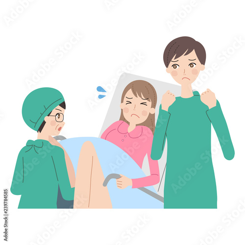 出産する女性。