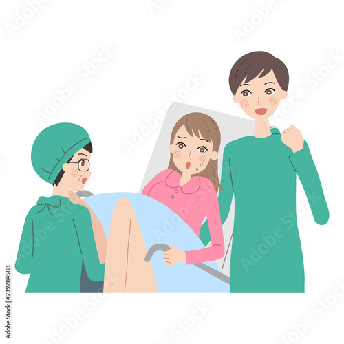 出産する女性。