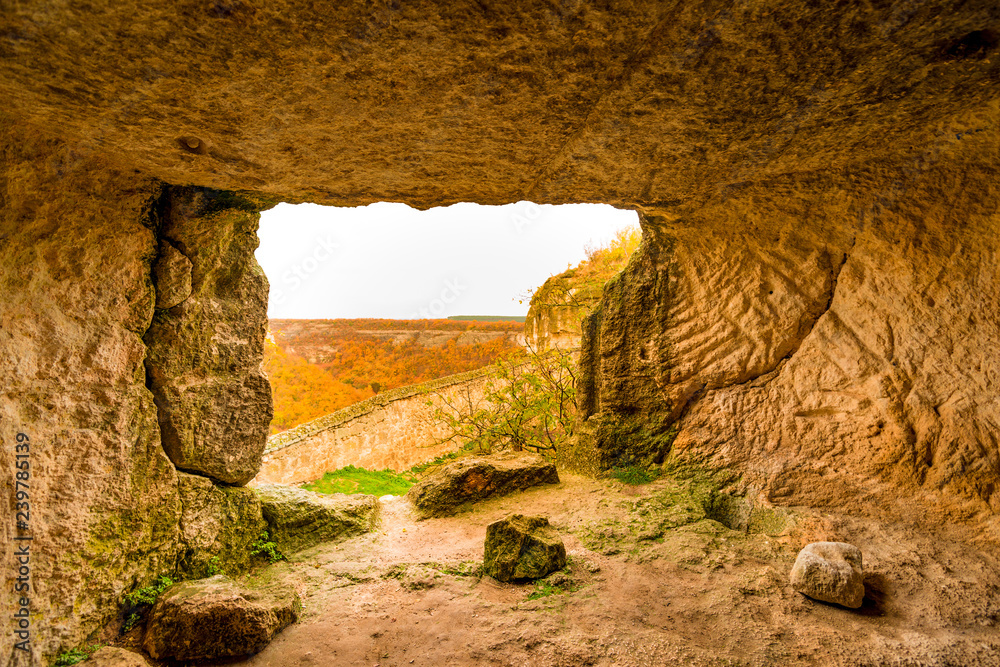 Stone ancient rooms of the cave city of Chufut-Kale, Bakhchisarai Crimea, autumn shots