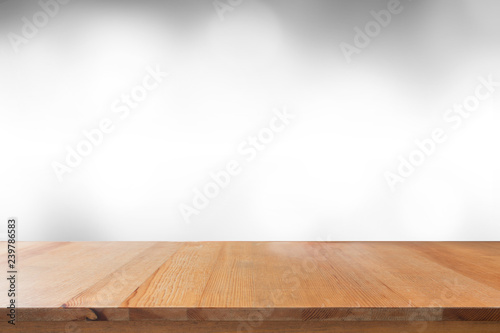Empty of desk with blurred light gray gradient bokeh abstract background
