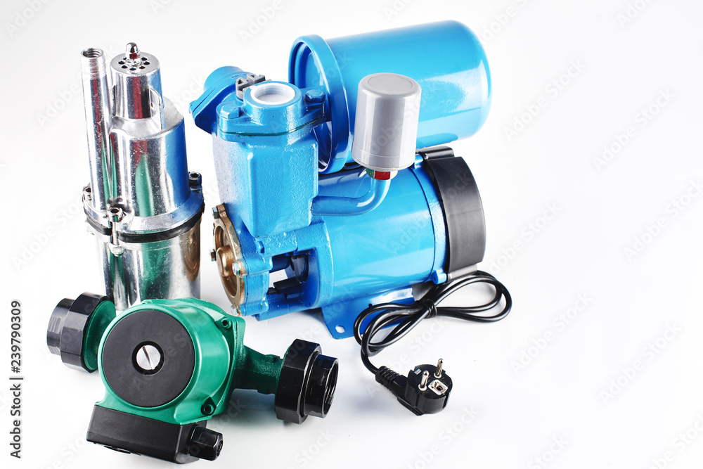 Various pumping equipment for heating and water supply on a white background isolated. Various pumping equipment for heating and water supply on a white background isolated.
