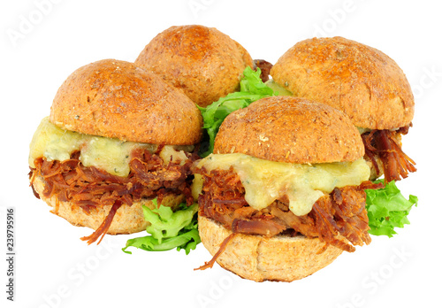 Small shredded beef sandwich sliders with melted cheese isolated on a white background