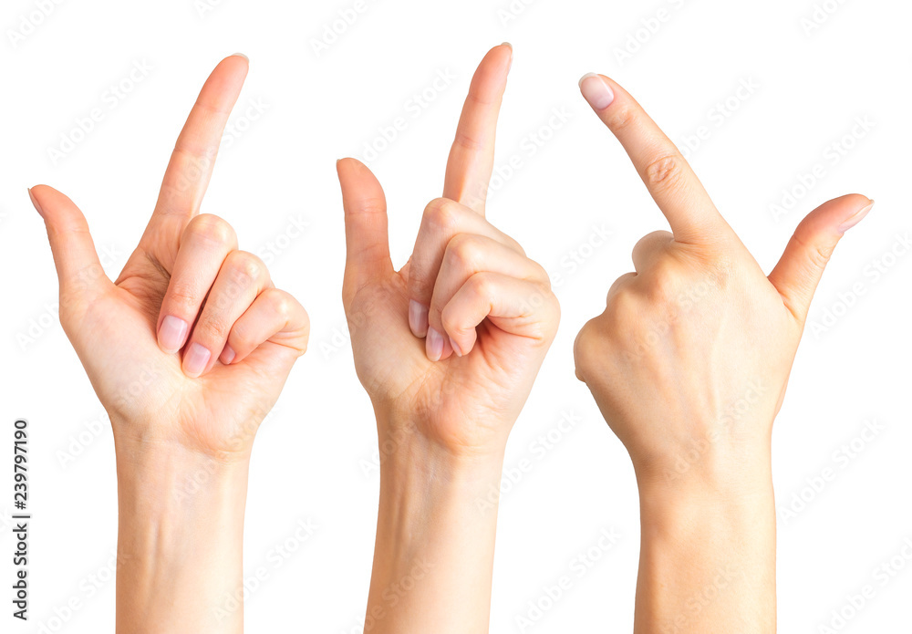 Woman hands with the index finger pointing up Woman hands with the index finger pointing up