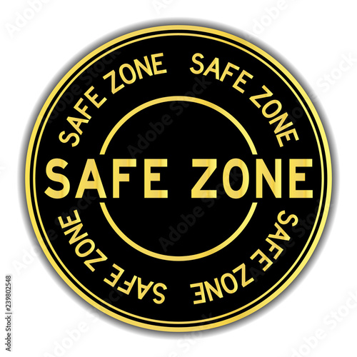 Black and gold color round sticker in word safe zone on white background