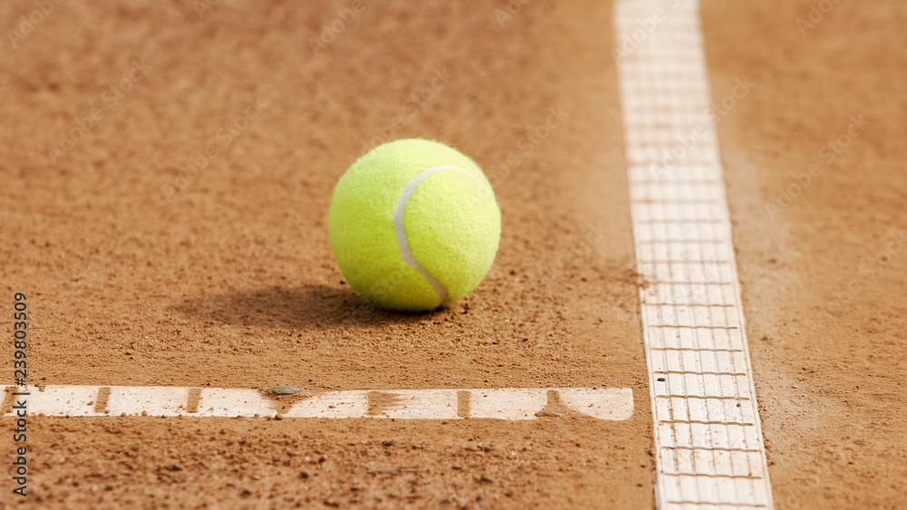 Yellow tennis ball lying on court, professional sport, active hobby, close-up