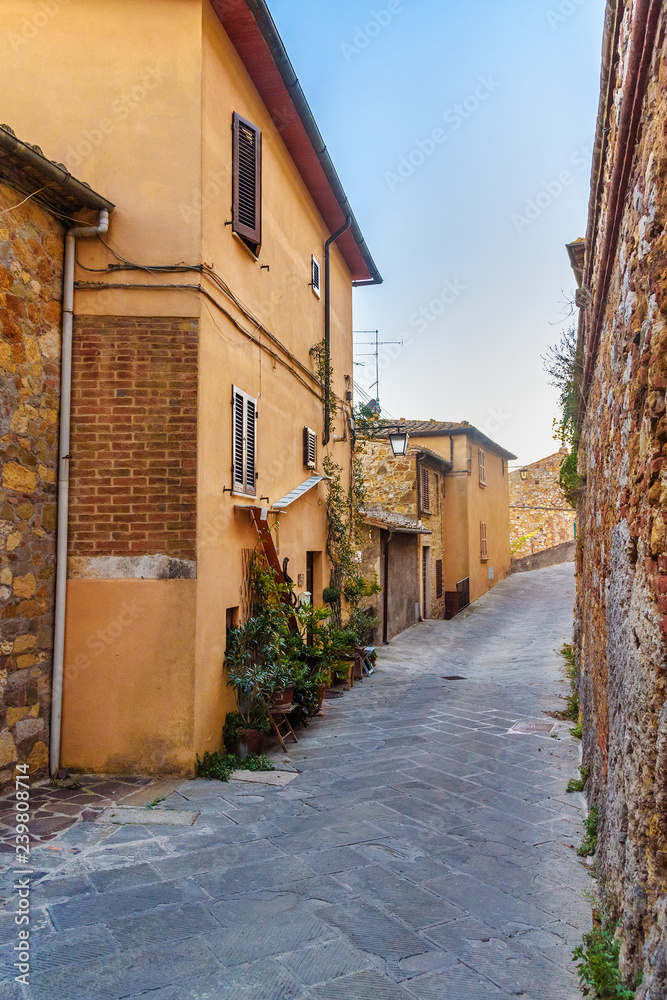 Fototapeta premium Narrow street in small town Petroio in Tuscay. Italy