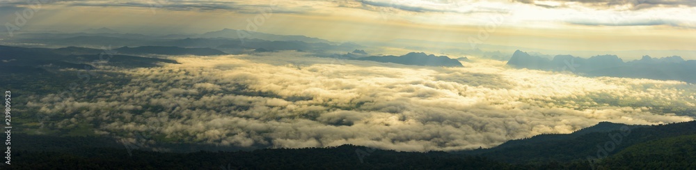 Panoramic mountains in the fog and clouds