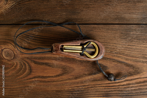 Traditional music instrument komus of Altai and Yakut people . Jaw harp. jew's harp. photo