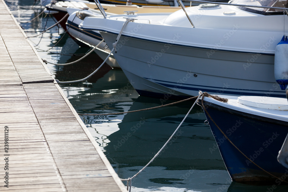 Fototapeta premium Modern yachts moored close up outdoor view