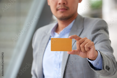 Showing identification card photo