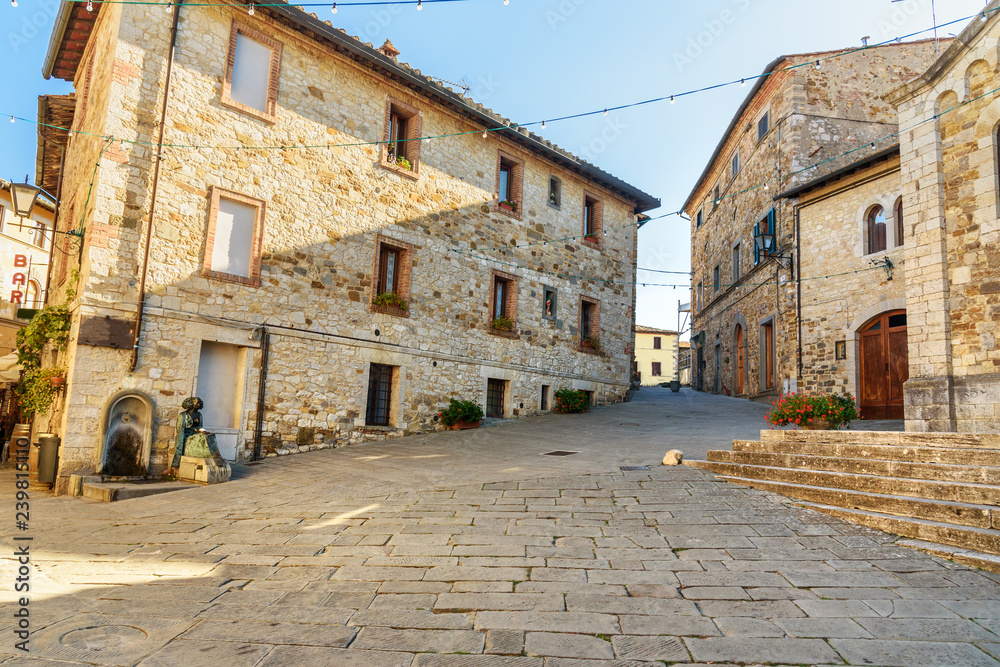 On the street in old medieval village Castellina in Chianti. Italy