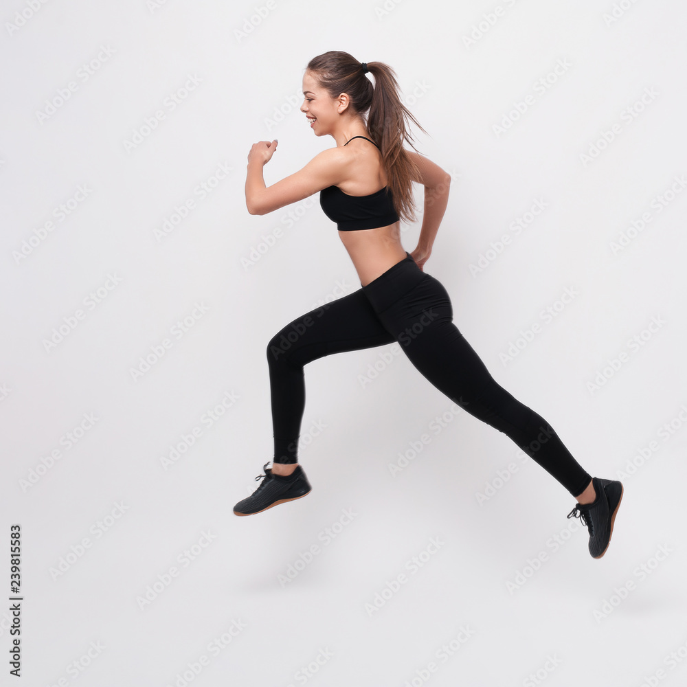 Side view of active sporty young running woman runner athlete with copy space concept sport health fitness loss weight cardio training jog workout wellness.