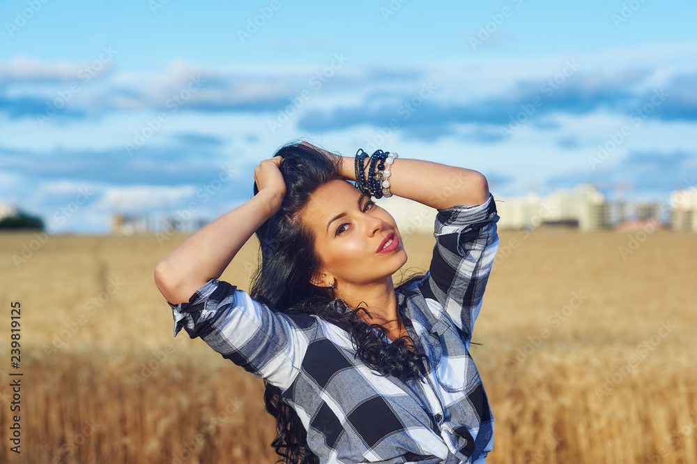Young beautiful girl on a walk outside the city Young beautiful girl on a walk outside the city