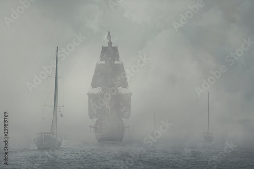  Yachts and a pirate ship in the fog.