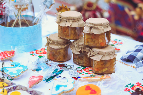 Banks with jam for the holiday Maslenitsa in Belarus