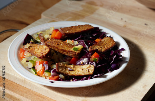 Smoked tofu with sesame and chopped vegetables
