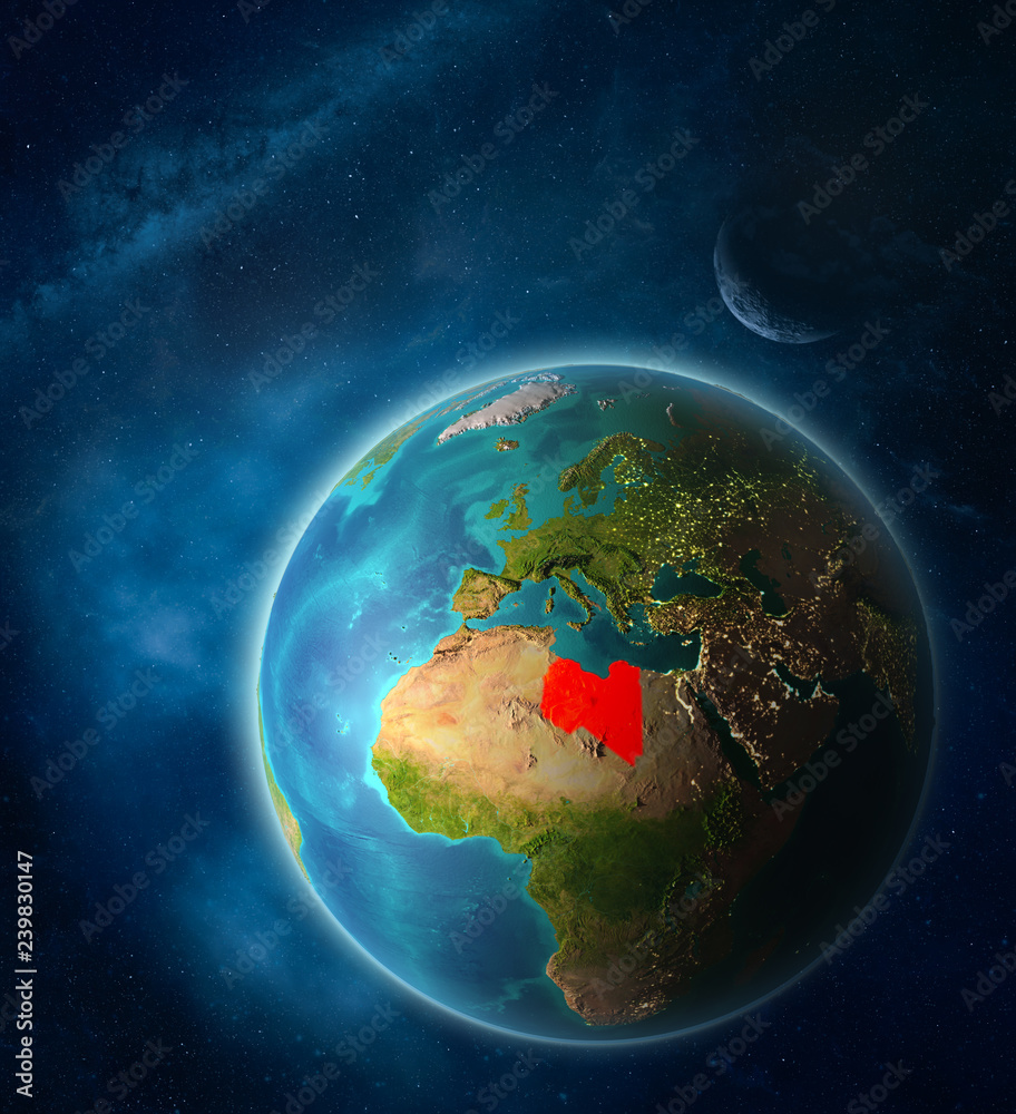 Fototapeta premium Libya from space on planet Earth in space with Moon and Milky Way. Extremely fine detail of planet surface.