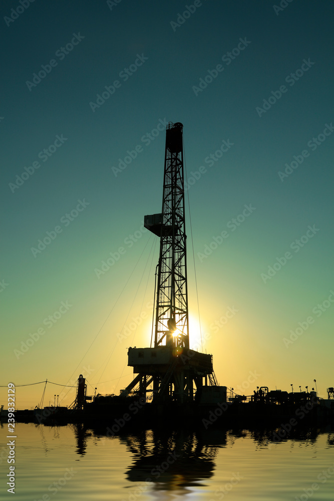 Oil drilling derrick in oilfield