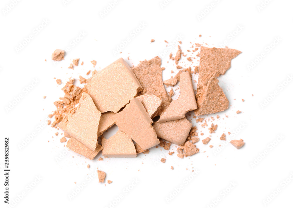 Fototapeta premium A broken neutral colored eye shadow make up palette isolated on a white background. Top view, flat lay. Copy space for your text