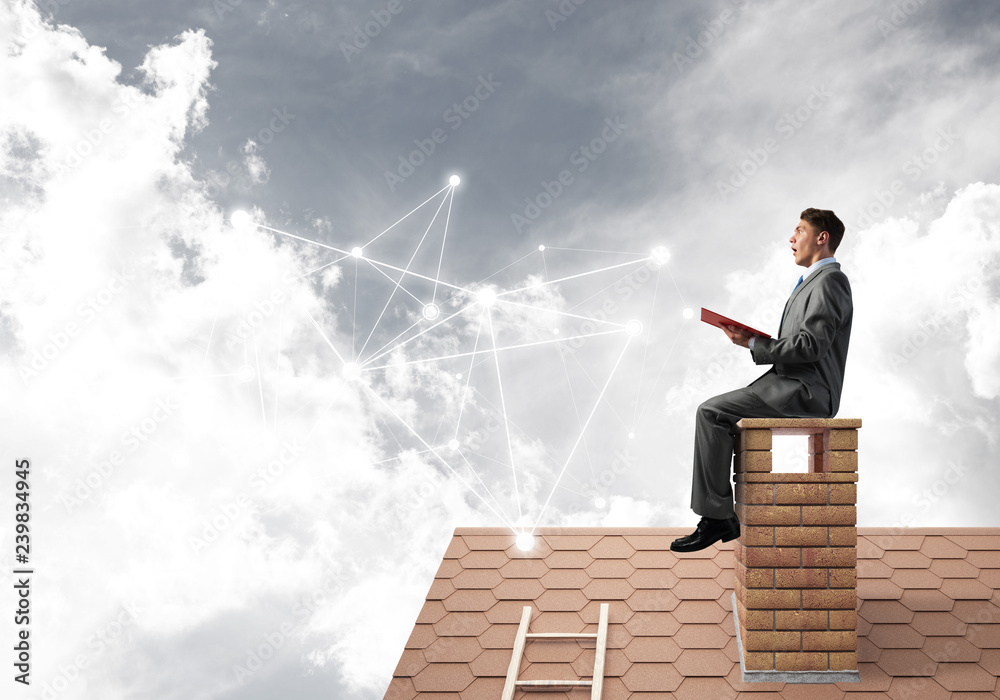 Man reading book and concept of social connection in sky Man reading book and concept of social connection in sky