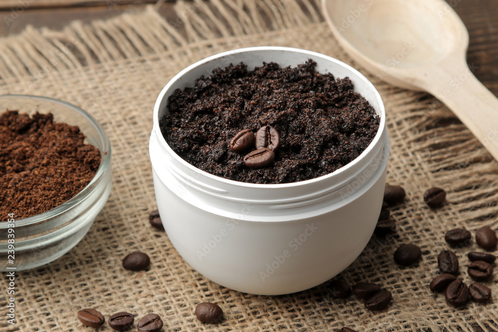 homemade coffee scrub in a white jar for the face and body and various ingredients for making scrub. spa. cosmetics. care cosmetics homemade coffee scrub in a white jar for the face and body and various ingredients for making scrub. spa. cosmetics. care cosmetics
