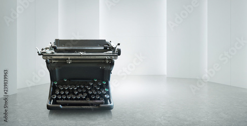 Old vintage retro black Typewriter on white empty space