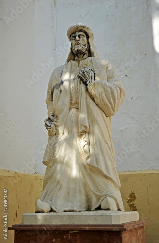 statue of the Arab poet Muqaddam ibn Muafa in Cabra, a town of the province of Córdoba, Andalusia, Spain photo