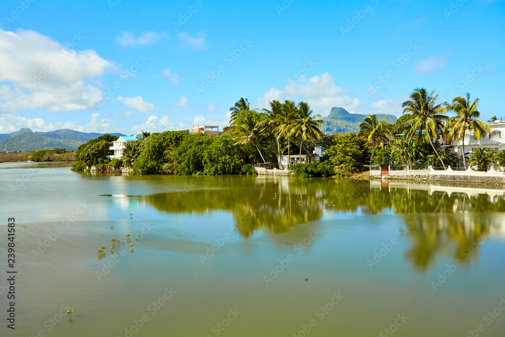 River scene in Mahebourg, Mauritius. Mahebourg is a small city on the south-eastern coast of Mauritius.