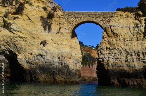 old stone bridge over the sea