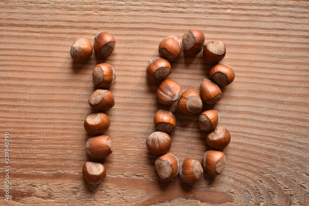 the number 18 shaped with hazelnuts the number 18 shaped with hazelnuts