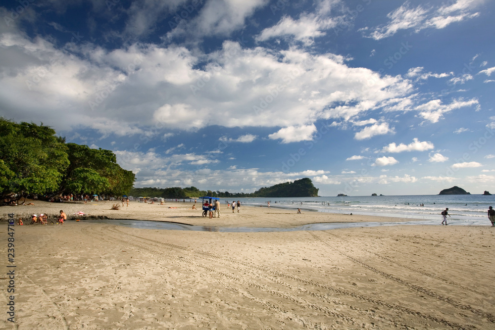 Tourists having fun at Manuel Antonio Beach, Costa Rica, in Afternoon