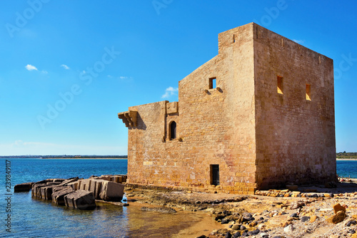 The historic Sveva Tower in Sicily in the Vendicari nature reserve near Noto and Syracuse, Italy photo