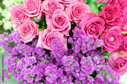 Romantic flower bunch background for anniversary and valentine day  pink roses and purple flowers 