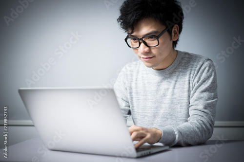 Young man using a laptop computer