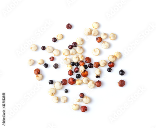 Pile of mixed raw quinoa isolated on white background. top view photo