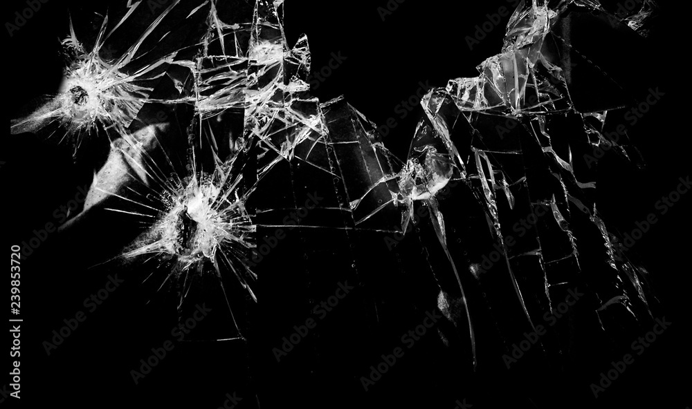 Broken glass on a black background. Broken glass on a black background.