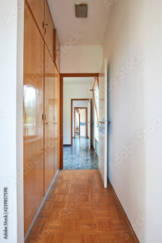 Corridor, room interior with wooden wardrobe in country house