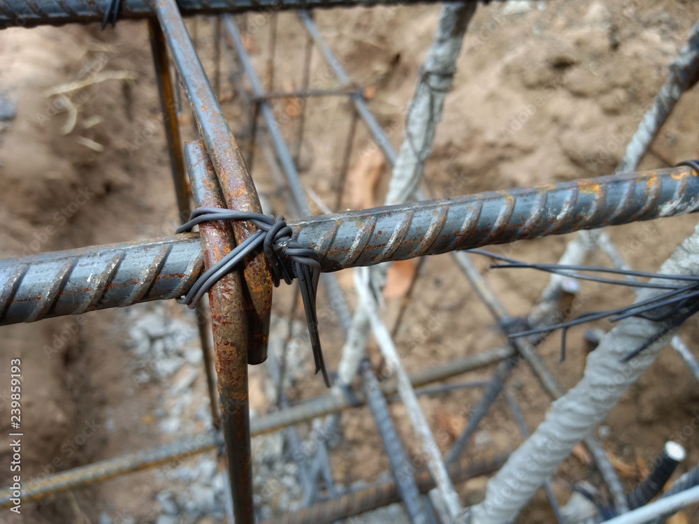 rusty barbed wire on blue background
