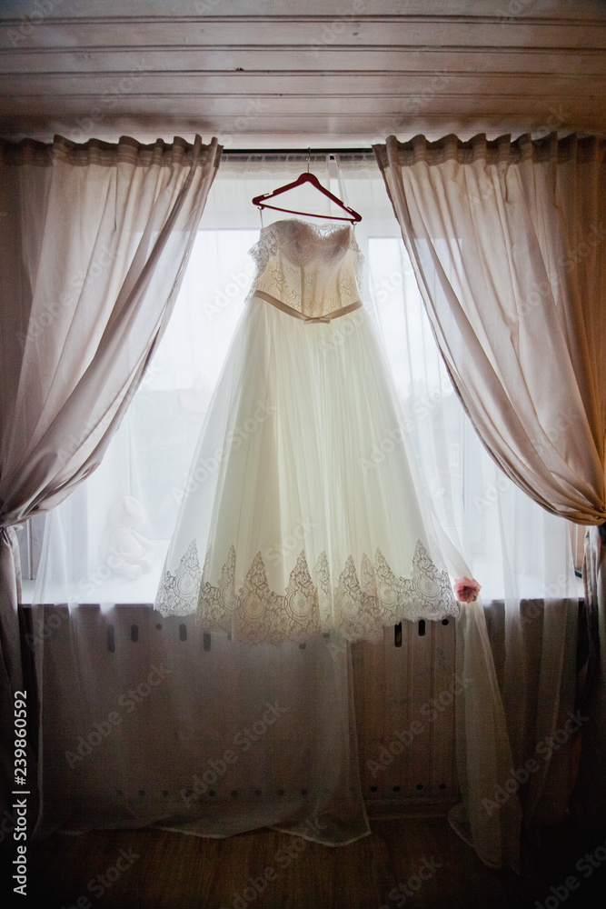 wedding dress on the window