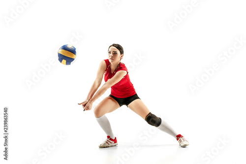 Fototapeta Naklejka Na Ścianę i Meble -  Female professional volleyball player isolated on white with ball. The athlete, exercise, action, sport, healthy lifestyle, training, fitness concept