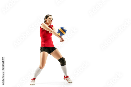 Female professional volleyball player isolated on white with ball. The athlete, exercise, action, sport, healthy lifestyle, training, fitness concept