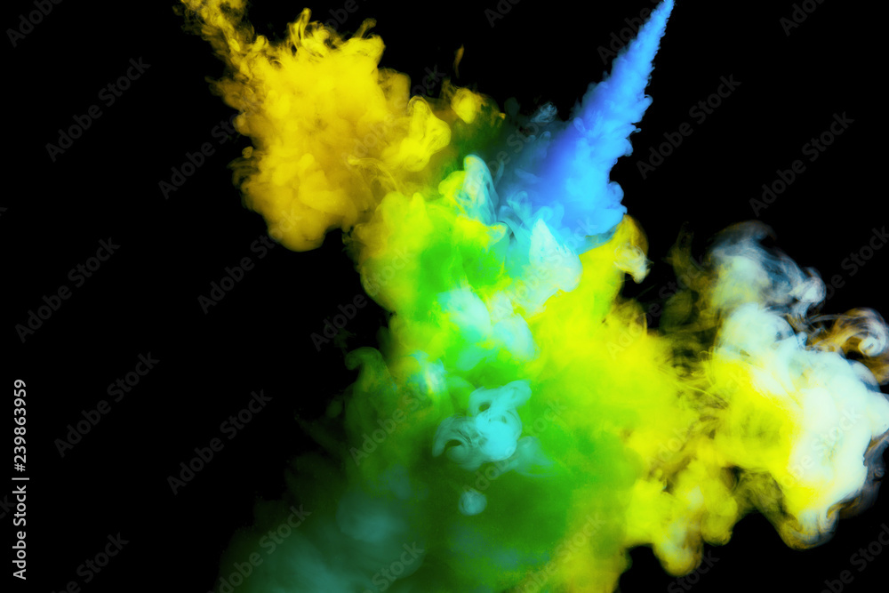 Fototapeta premium paint stream in water, colored cloud, abstract background, process of mixing multicolored dye on a black background