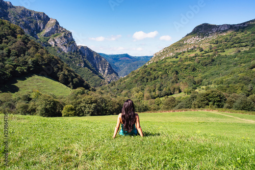 Landscape of woman in mountains of Asturias, Spain