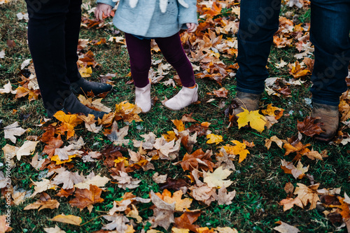 Family in the Autumn Leaves